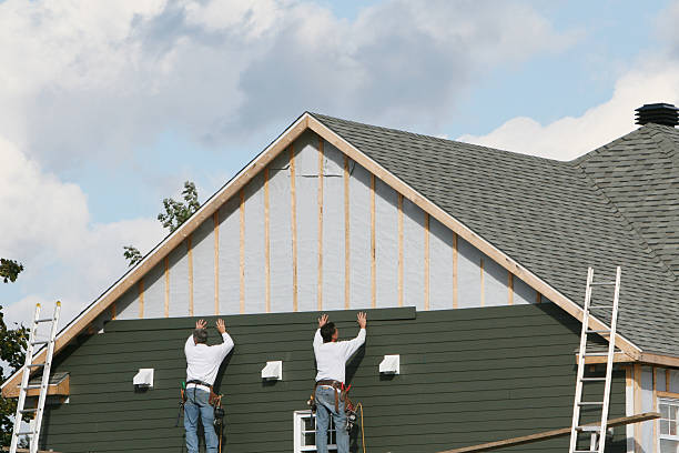 Professional Siding Installation technician working in Satellite Beach, FL